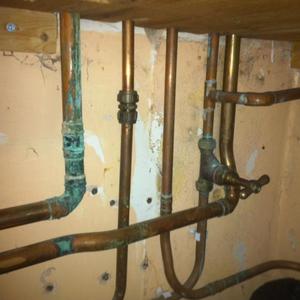 Pipes leading up into boiler