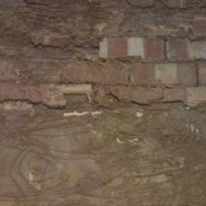 where removed tile area meets good plaster