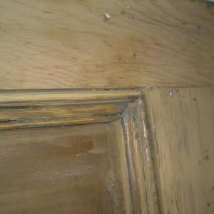 bottom right corner of top right door panel