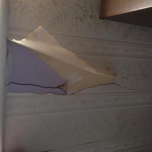 back side of house inside crack