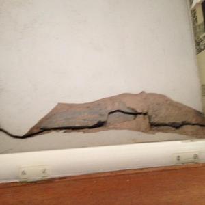 back side of house inside crack