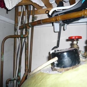 top of HW tank pipes