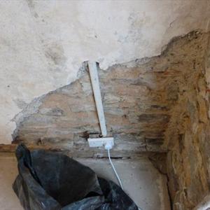 Render removed from party wall