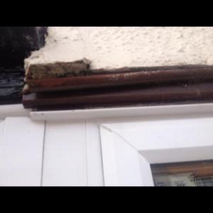 Outside wall where damp is coming in