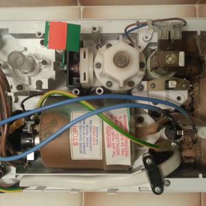 Triton t80 shower with scorched and melted blue wi