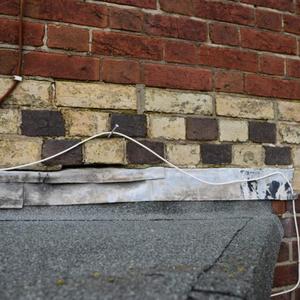 Flashing above the flat roof