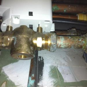 Motorised valve on right of cylinder