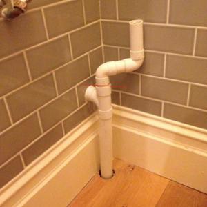 Cloakroom waste pipe