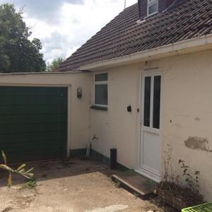 Front left side of house - front door