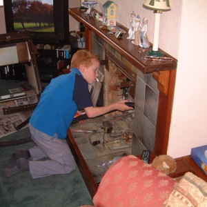 Cleaning old back boiler as child.