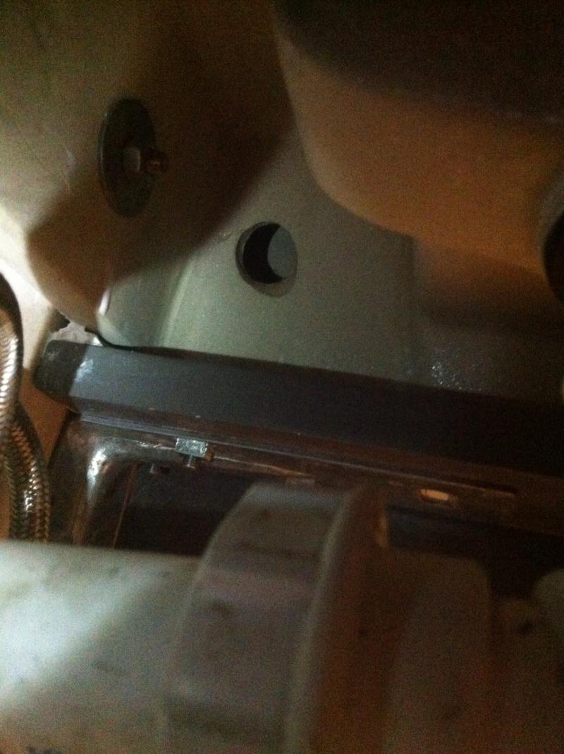 10pence sized hole under basin, connected to waste