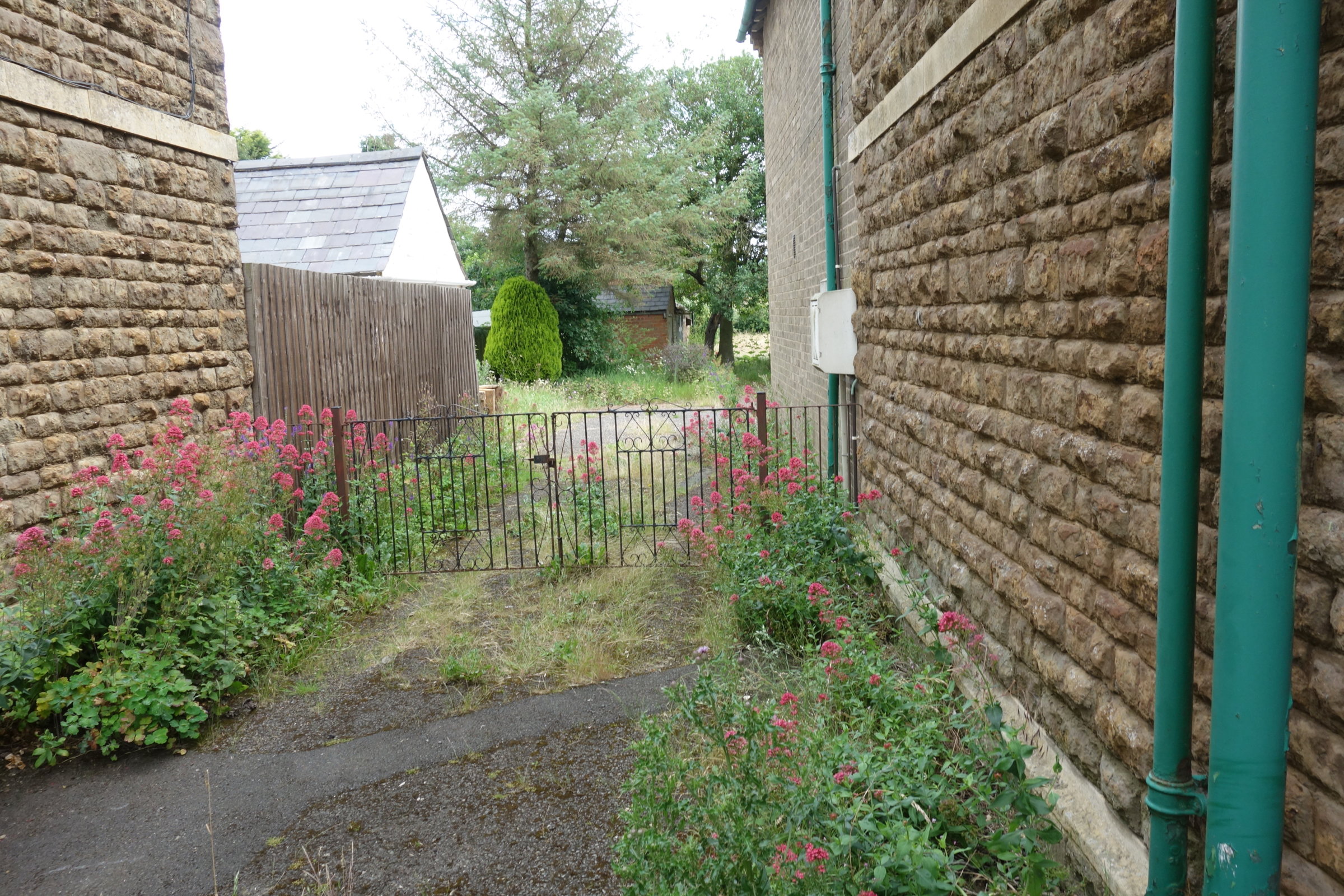5 - Outside To Left Of House  Looking Back