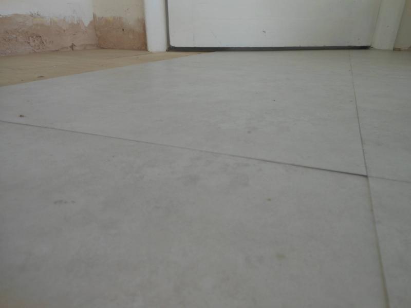 Another tile edge lifting