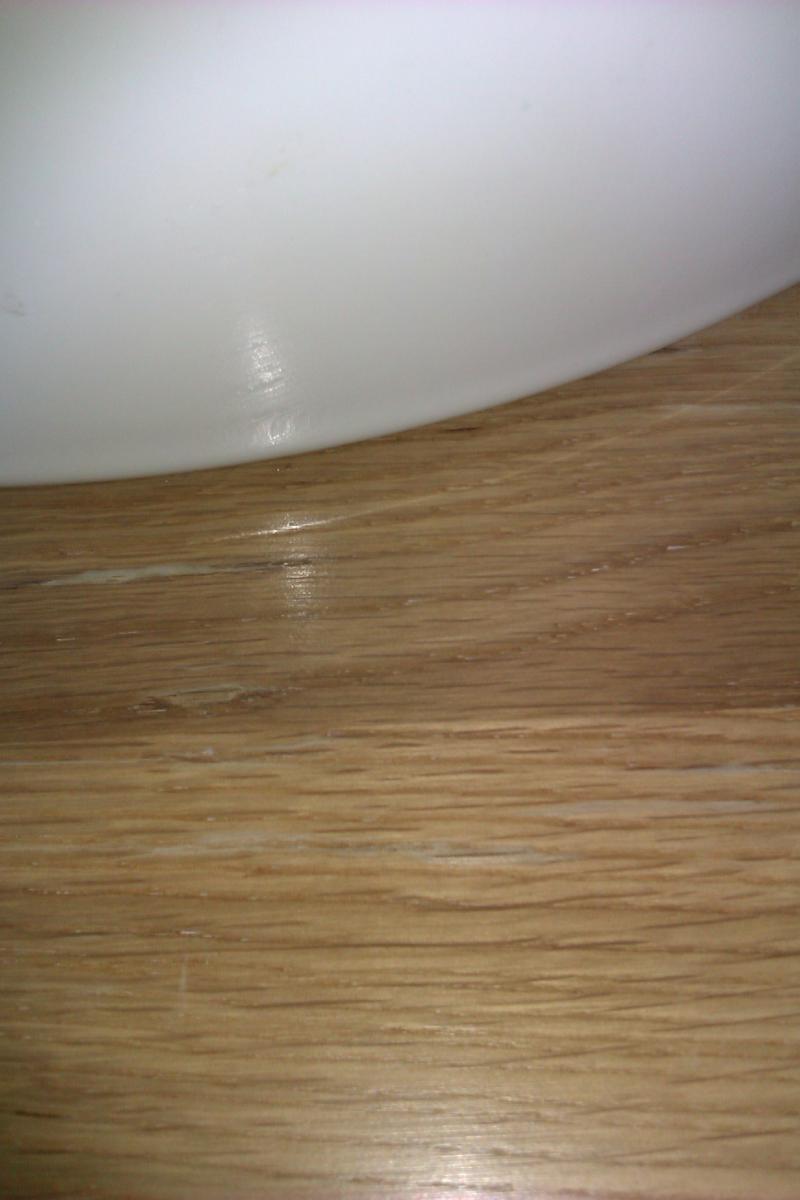 blistering on solid oak cabinet