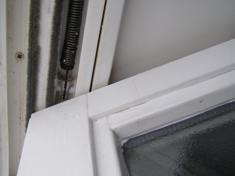 Bottom of sash window  tilted in