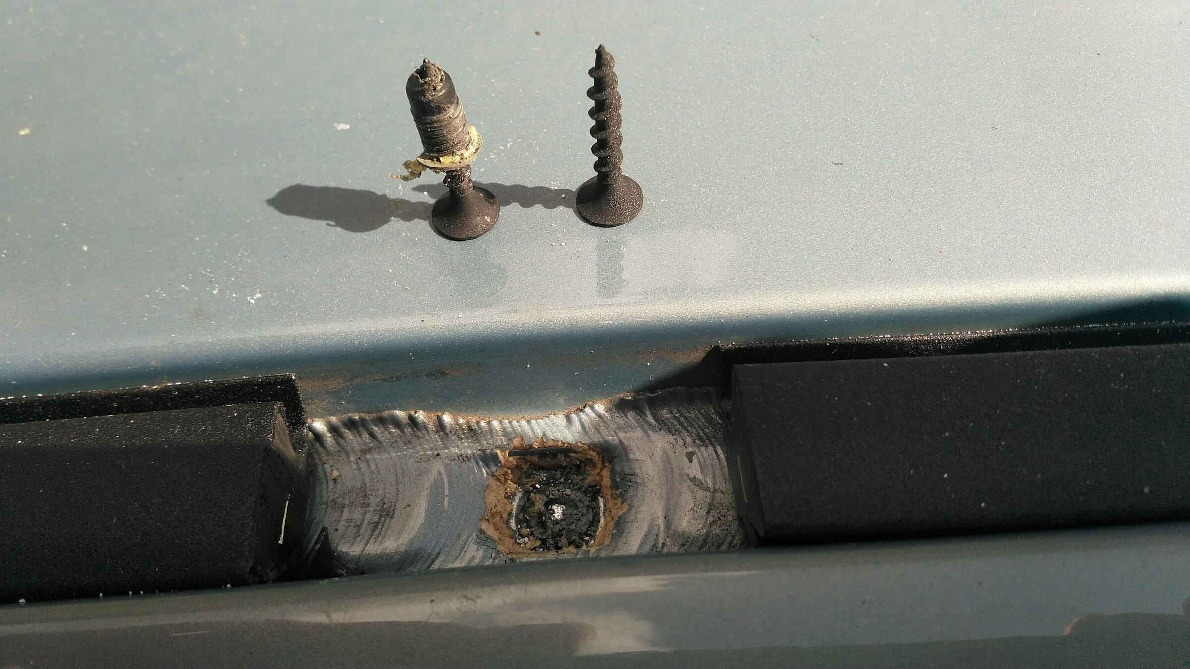 Broken Carbon Steel screw in plastic plug
