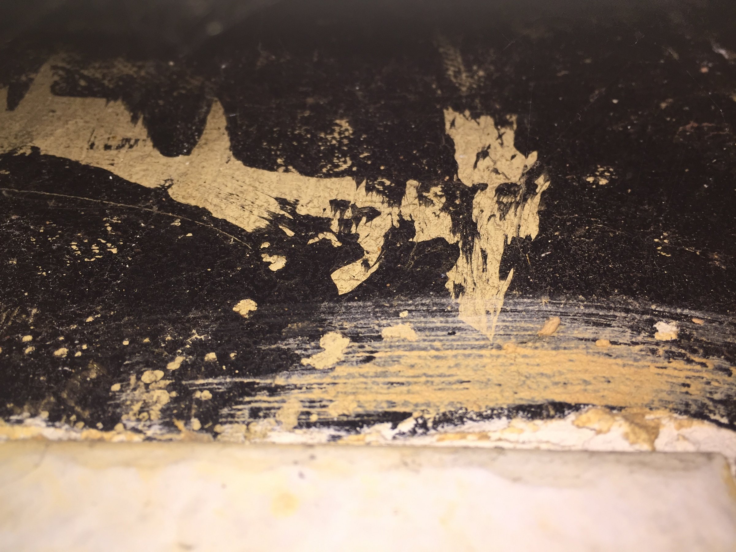 Brown board on kitchen chimney