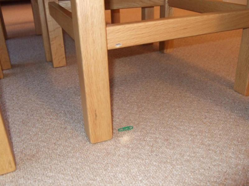 chair showing hole and sawdust