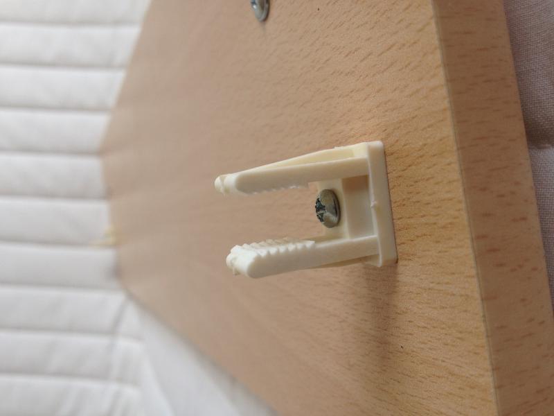 Clip on back of filler panel