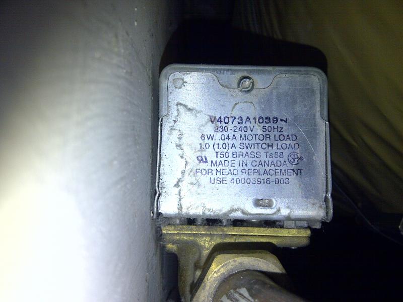 Close up view of 3 port valve motor unit.