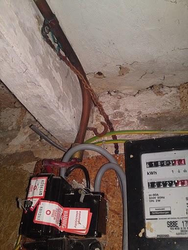 Copper conduit carrying tails to upstairs meter