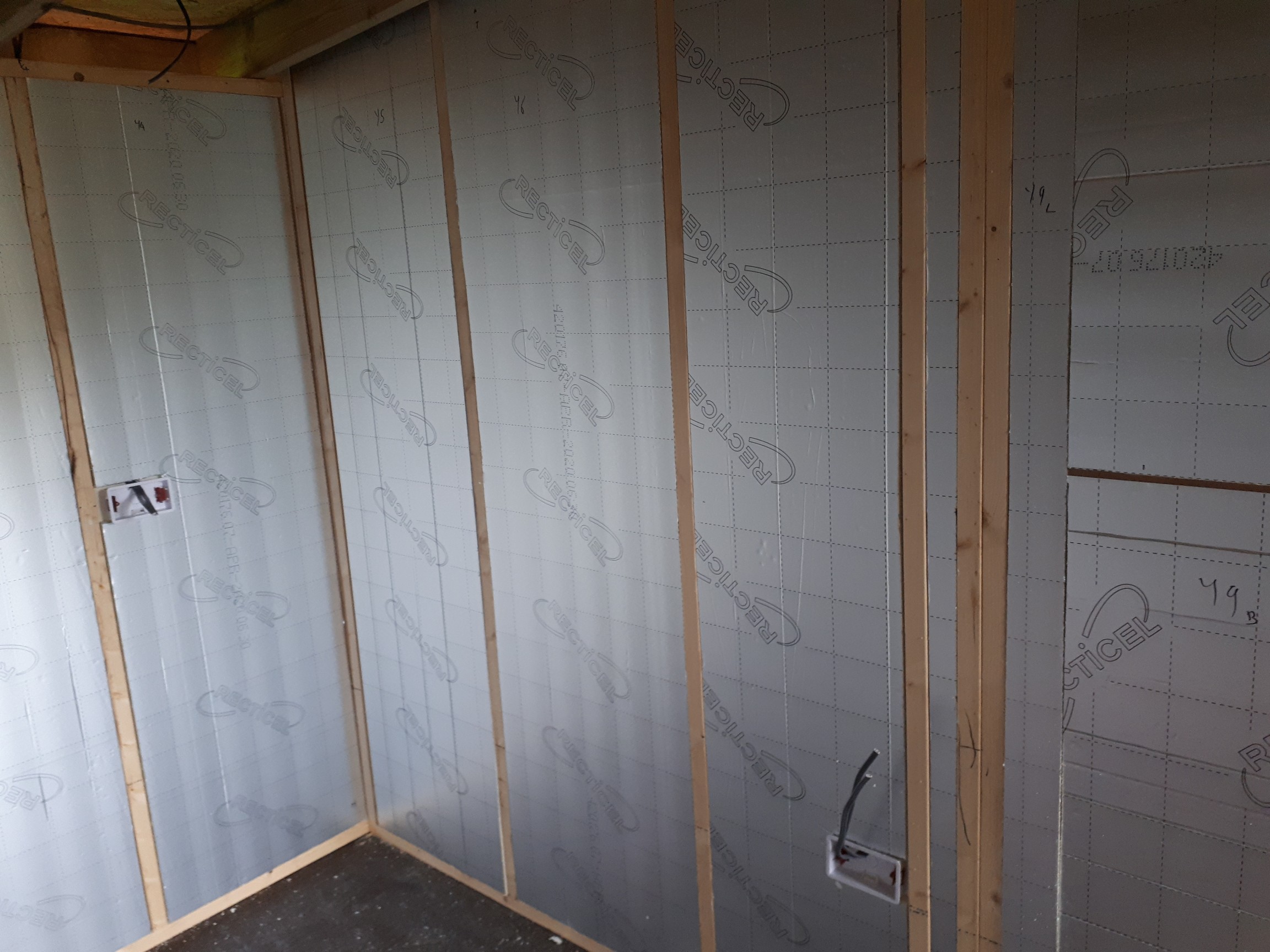 cutting the insulation to fit