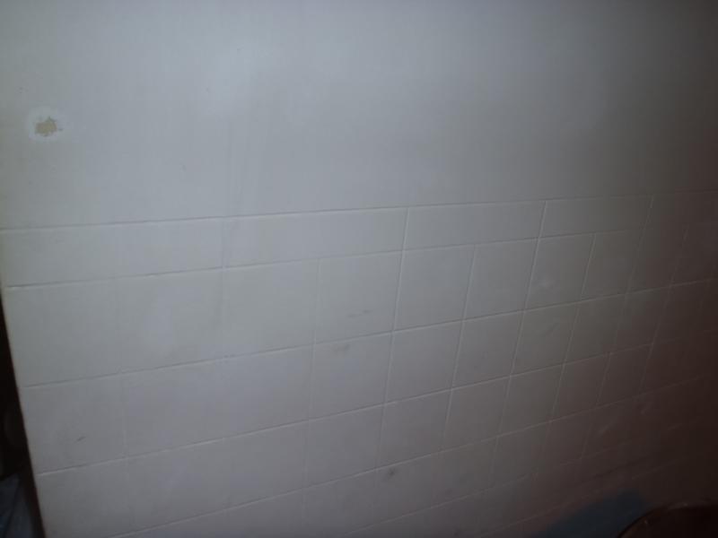 fake tile etched in wall