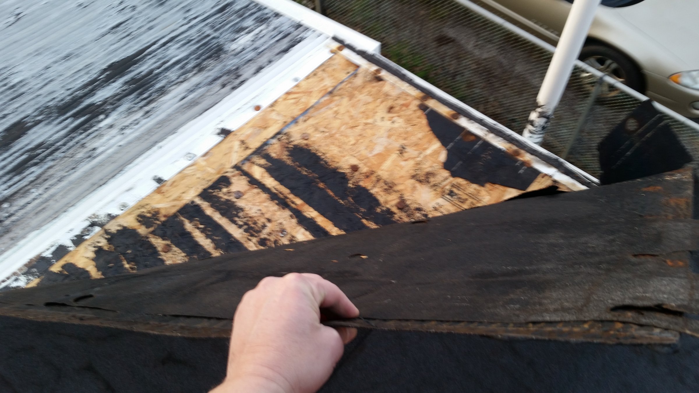 Flat Roof Peeled Up by Wind