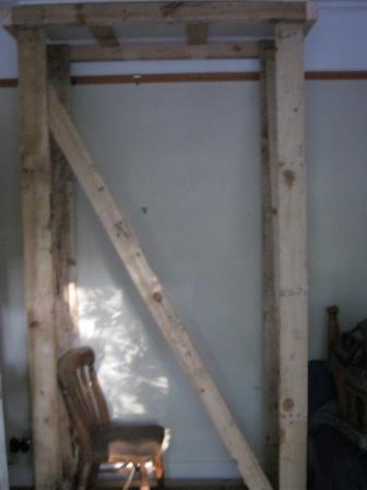 Frame to hold plasterboard in position