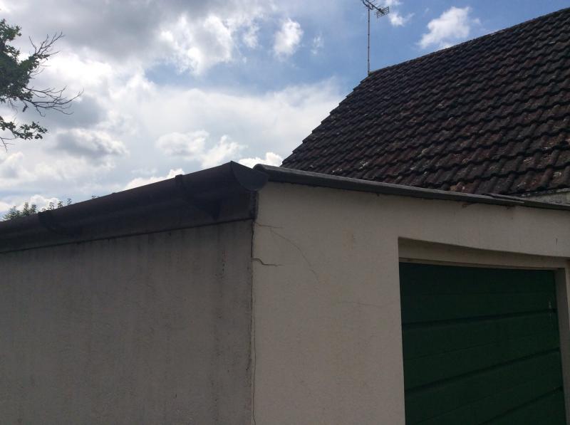 Front left corner of garage