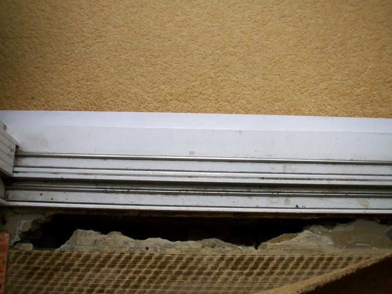 Gap in lounge floor at edge of sliding door