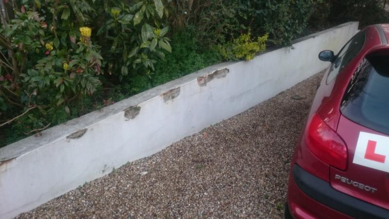 garden wall with holes in cement