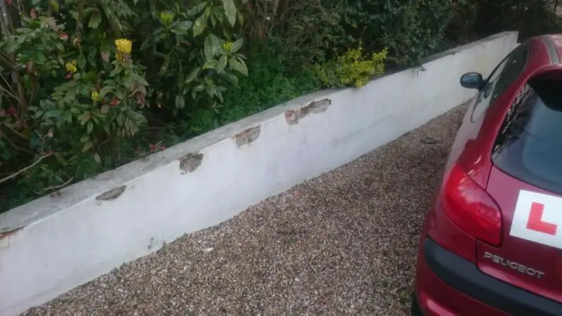 garden wall with holes in cement