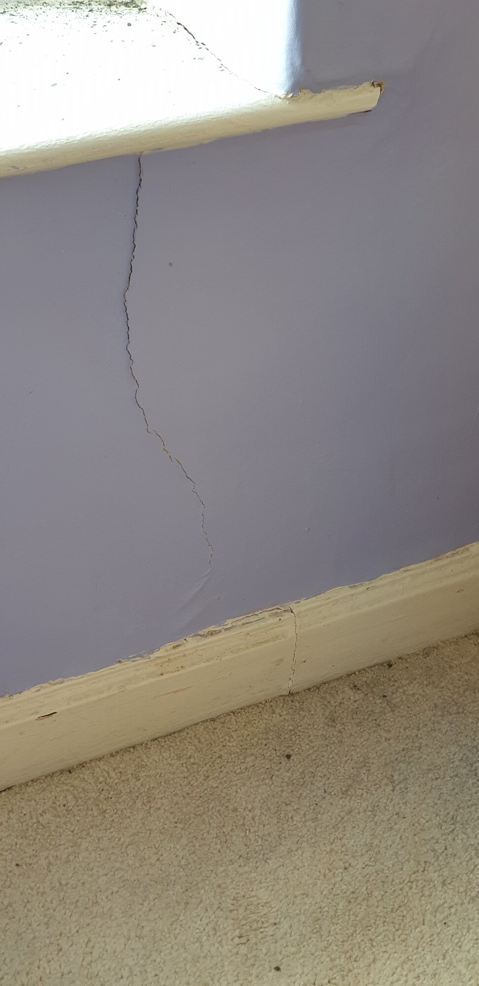 Hairline crack down to skirting boards