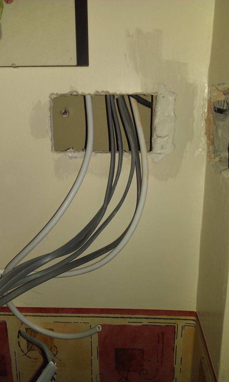Hall light switch by front door cables