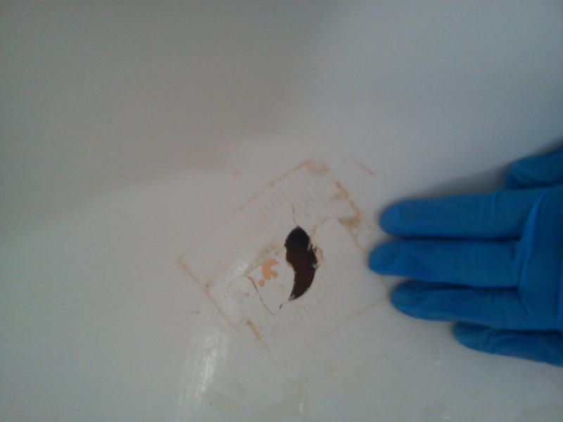 Hole in plastic bath