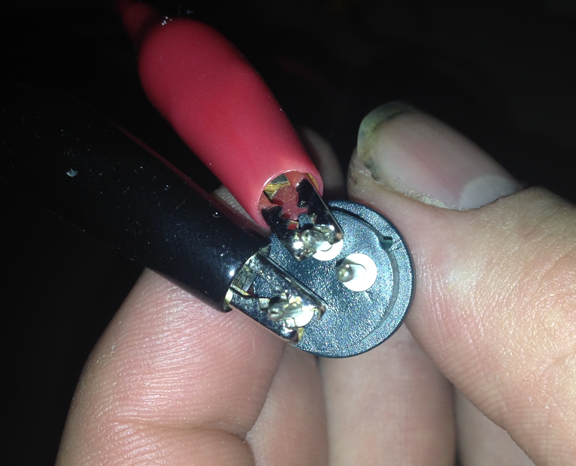 Unpluged LED Christmas lights sometimes flicker when I turn my bedside