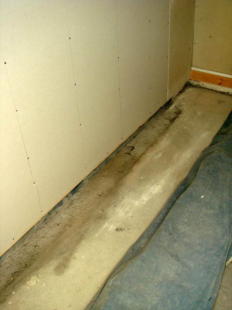 Internal wall below window.