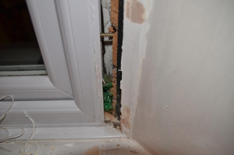 Large gap - stuffed with green plastic bag