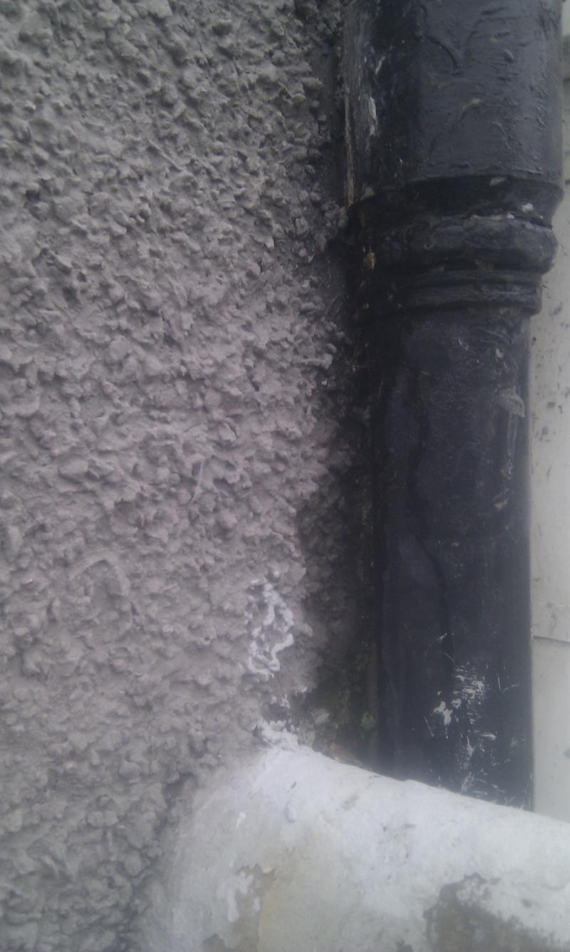 Leaking Downpipe on other side of wall