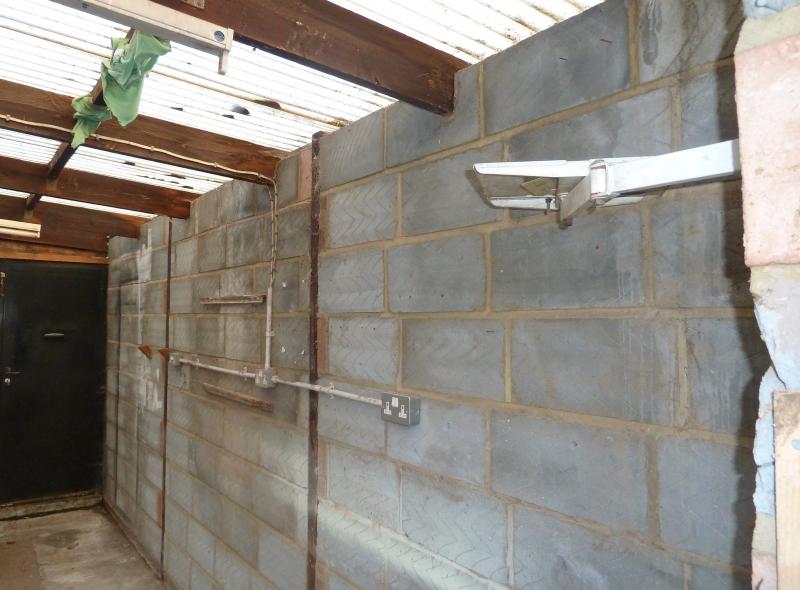 Long wall from main doors