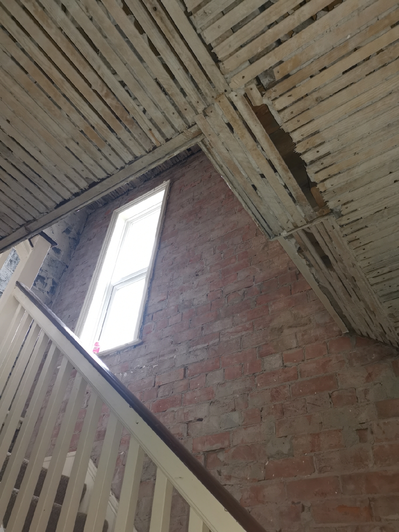 Looking upstairs from hall