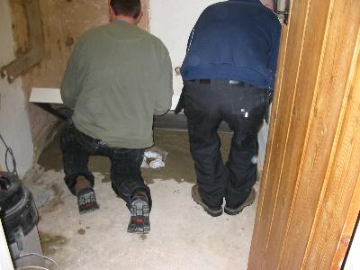 Lowering the tray into position.