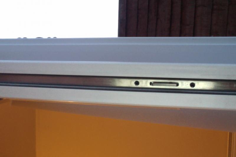 Patio door lock hook