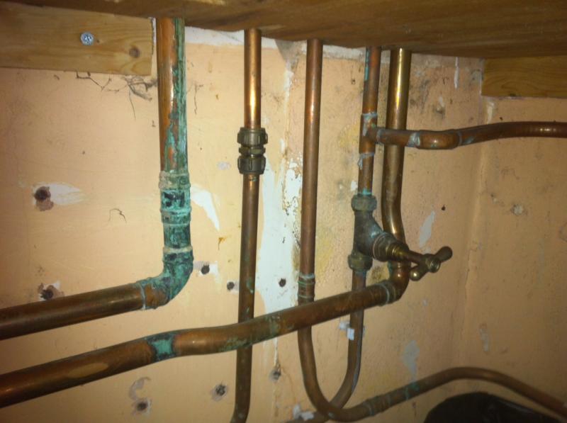 Pipes leading up into boiler