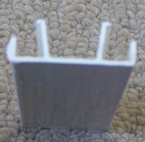 Plastic trim fitted to box inside and out