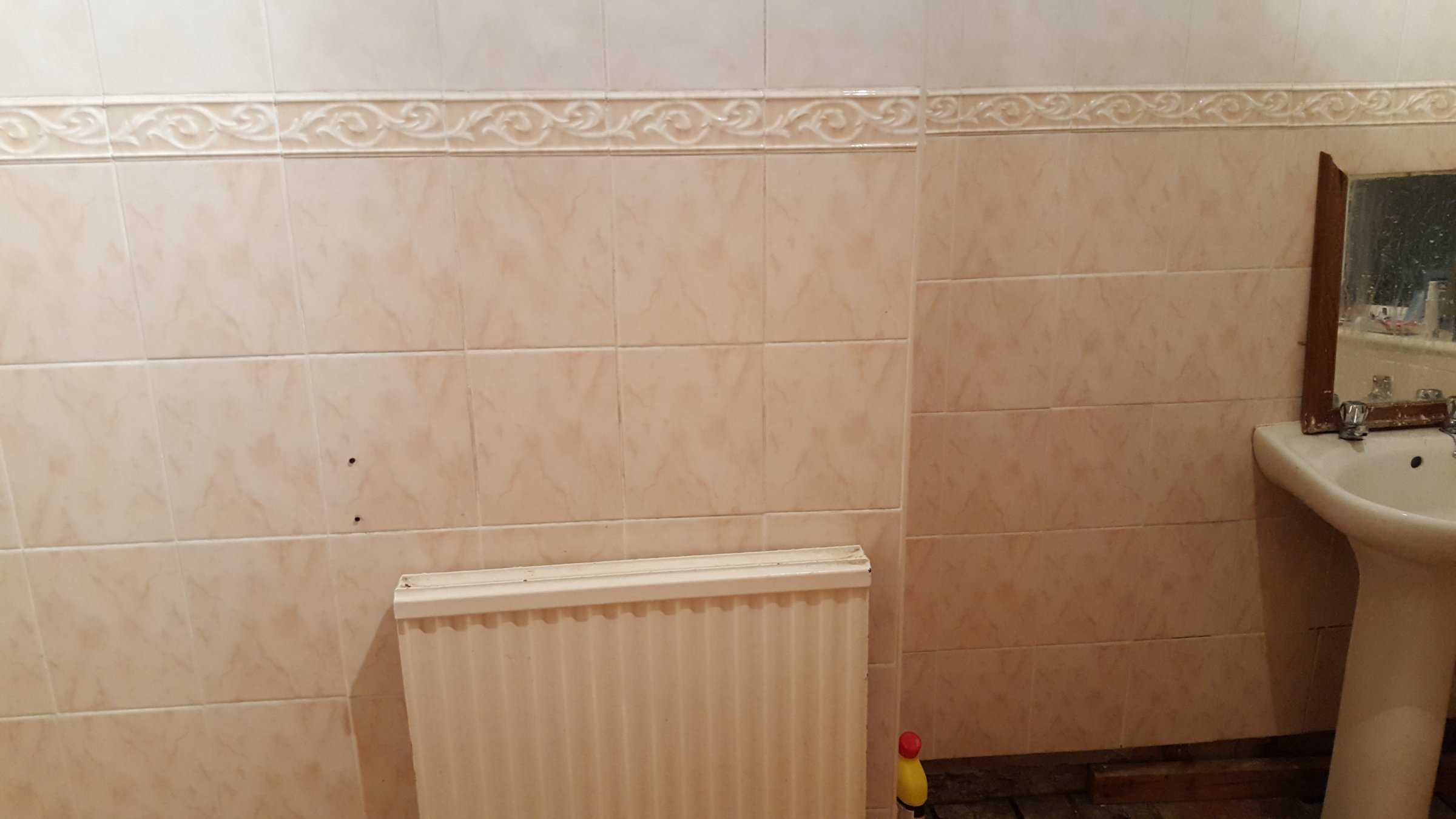 Radiator on chimney breast