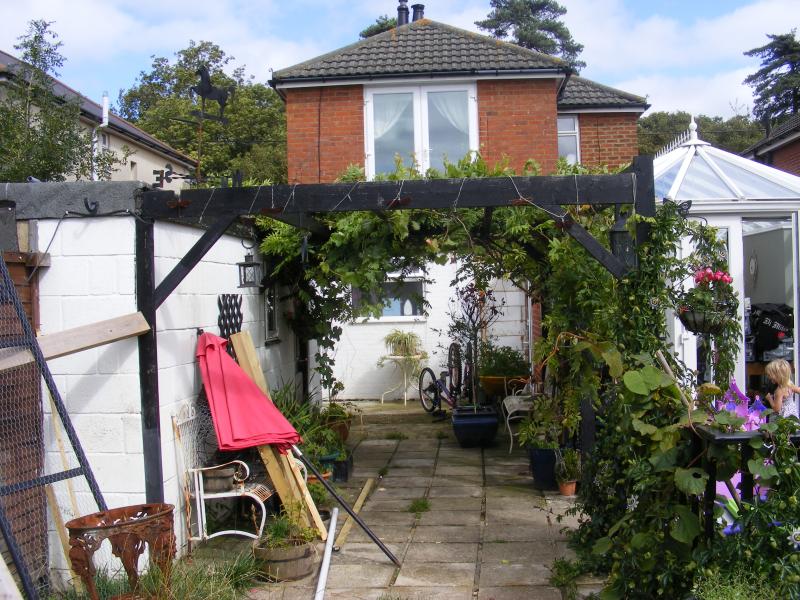 REAR VIEW WITH UPPER FRENCH DOORS
