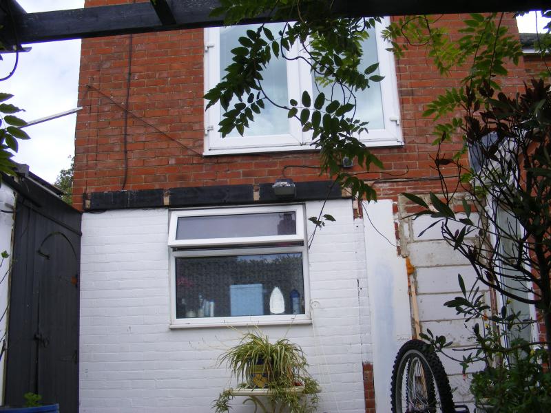 ROOF COMING FROM BELOW STEP ON UPPER FRENCH DOORS