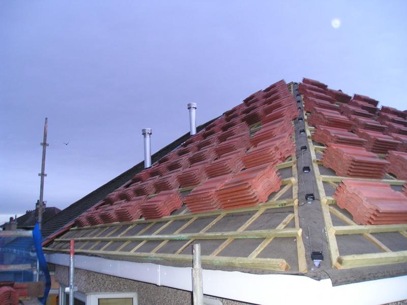 roof loaded, chimneys down,facings and soffits ins